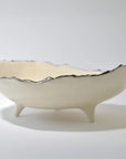 Deep bowl on leg with silver ruff rim